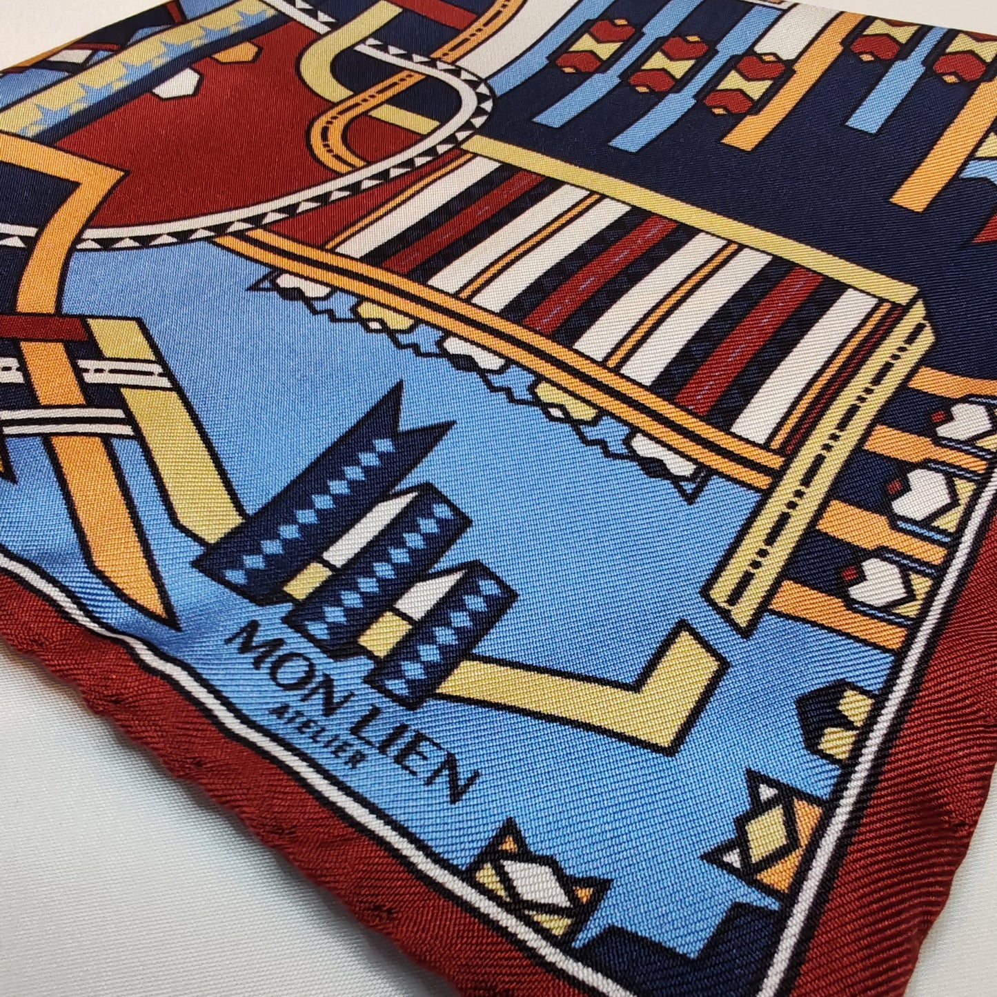 Pochette in seta | I nastri danzanti | blu e terracotta