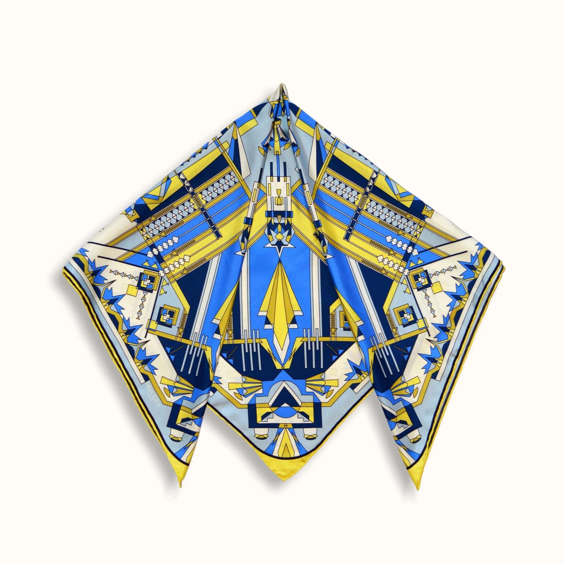 quadrato in twill di seta con angoli piegati dal disegno tessile geometrico in variante avorio giallo blu