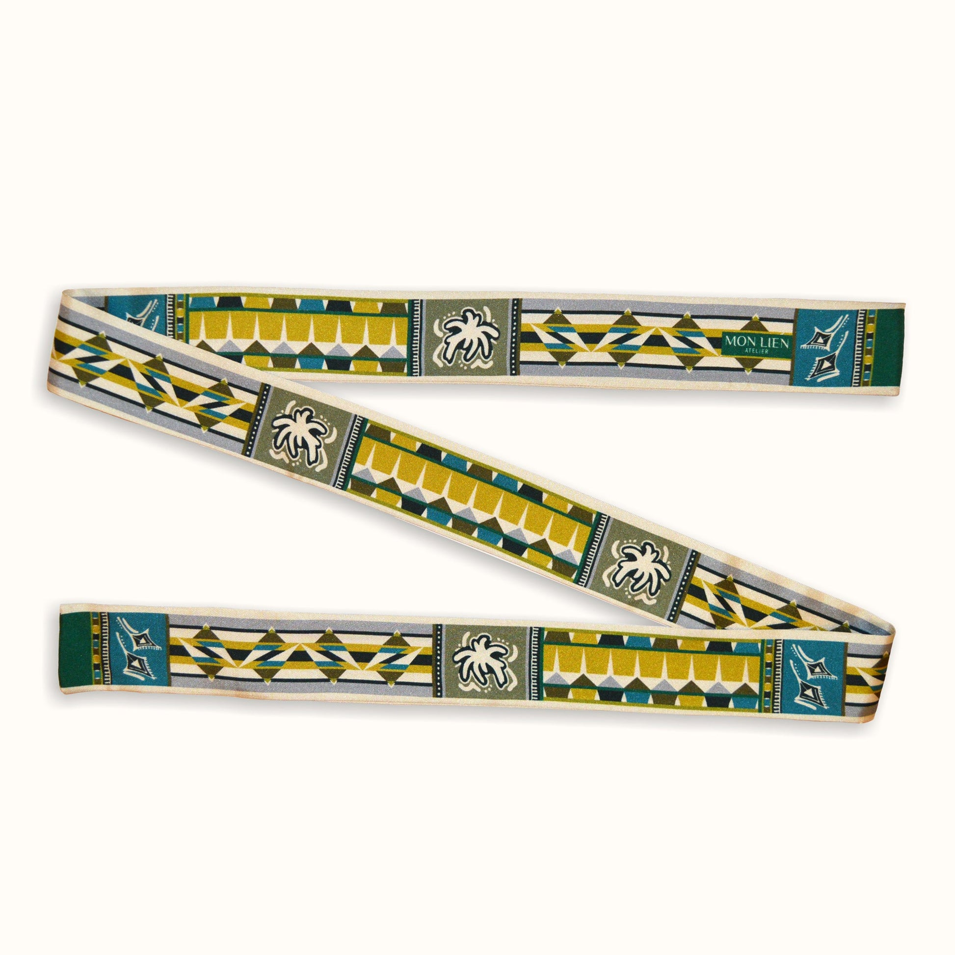 cintura morbida con disegni geometrici e logo Mon Lien Atelier colori avorio verdi ocra