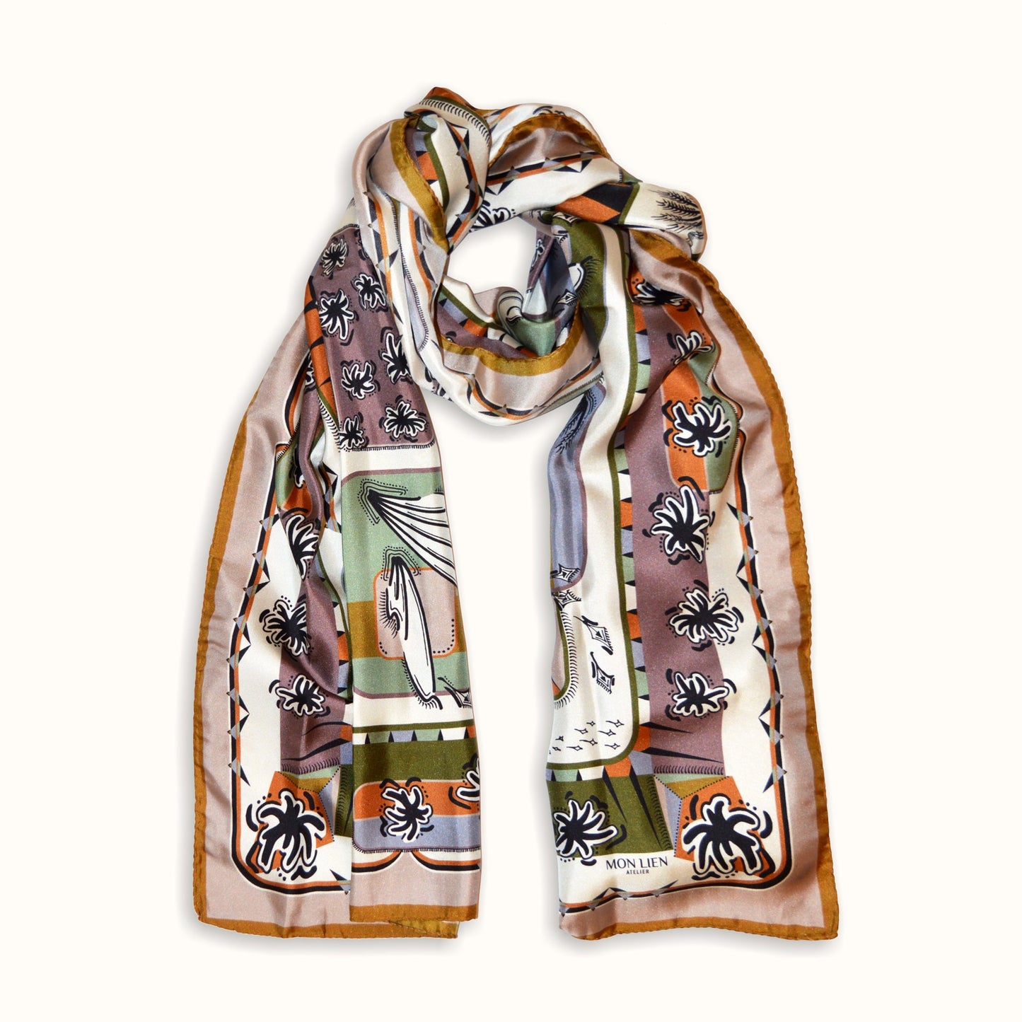 meraviglioso foulard in seta arrotolato con logo mon lien atelier e segni grafici colorati