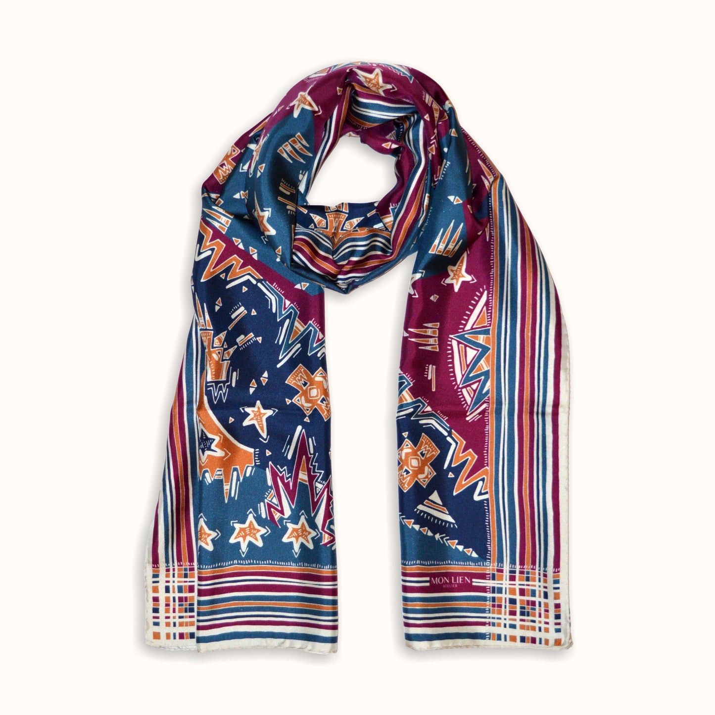 sciarpa  in seta arrotolato vista frontale righe e motivi tinte bordeaux e blu